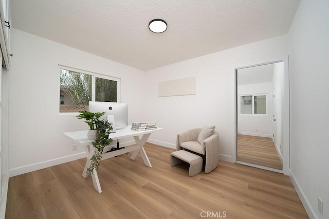13282-13280 Nevada St, Westminster, CA 92683 - home office with light wood finished floors and baseboards