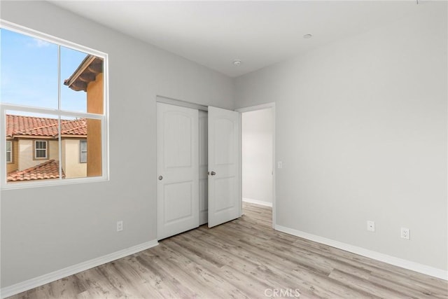 26703 Lexington Ln, Saugus, CA 91350 - unfurnished bedroom with wood finished floors and baseboards