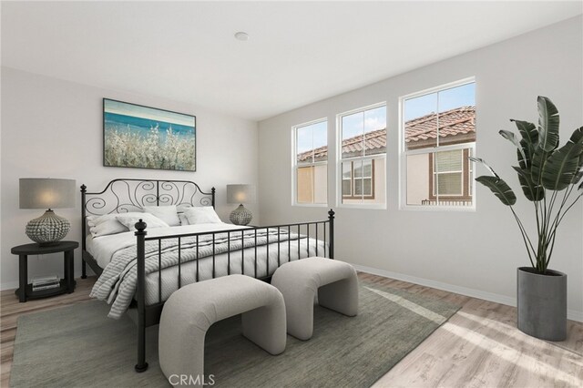 26703 Lexington Ln, Saugus, CA 91350 - bedroom featuring wood finished floors, baseboards, and multiple windows