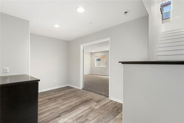 26703 Lexington Ln, Saugus, CA 91350 - unfurnished dining area with wood finished floors, plenty of natural light, stairs, recessed lighting, and baseboards