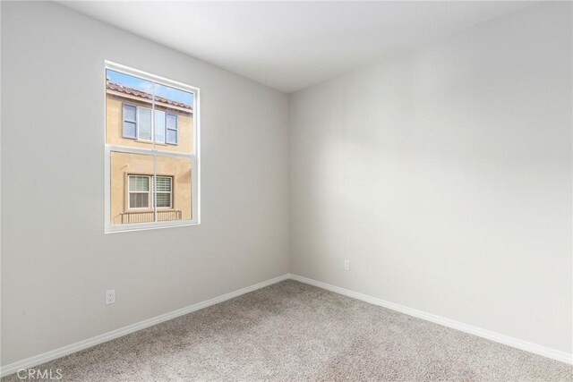 26703 Lexington Ln, Saugus, CA 91350 - unfurnished room featuring carpet floors and baseboards