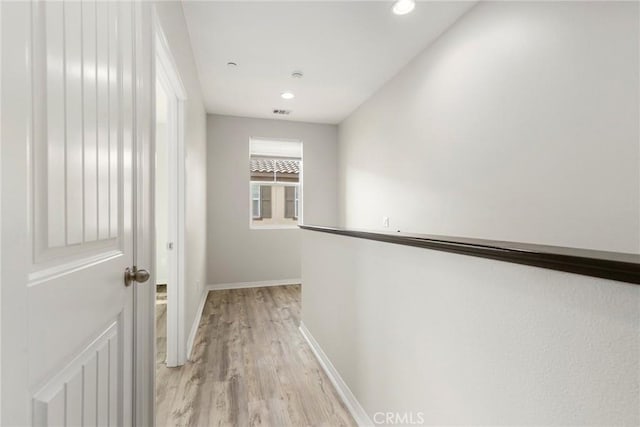 26703 Lexington Ln, Saugus, CA 91350 - hallway featuring light wood-style floors, baseboards, and recessed lighting