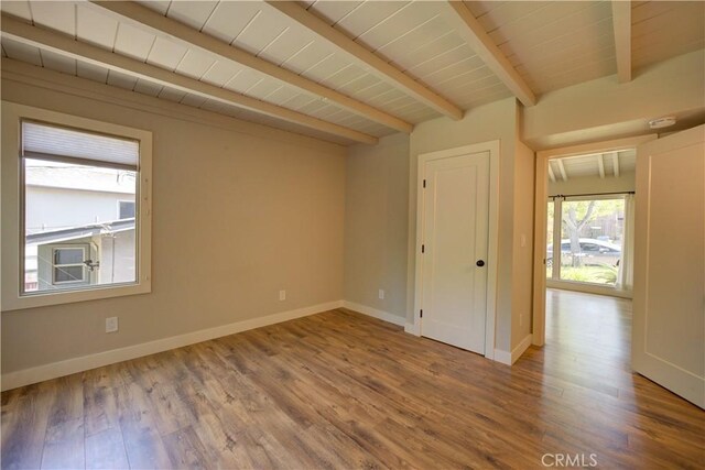 810 Meinecke Ave, San Luis Obispo, CA 93405 - unfurnished room featuring wood finished floors and a wooden ceiling with exposed beams