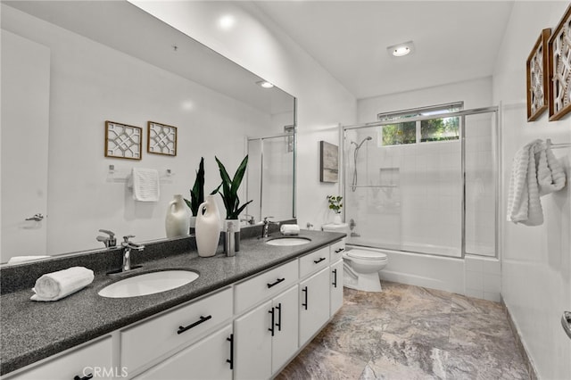 4462 Fallsbrae Rd, Fallbrook, CA 92028 - full bathroom with double vanity, toilet, and shower / bath combination with glass door