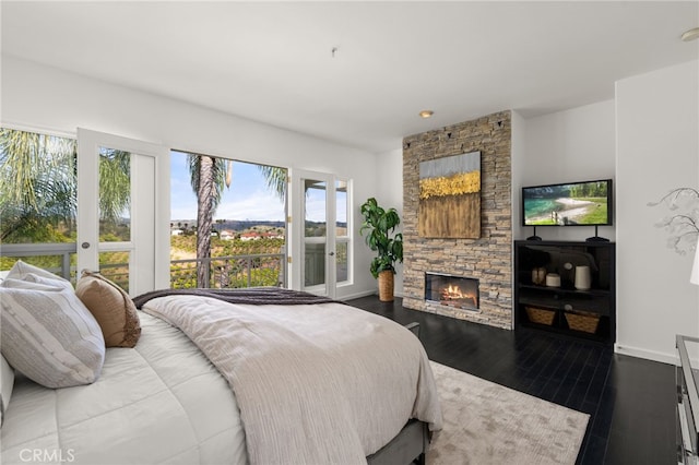 4462 Fallsbrae Rd, Fallbrook, CA 92028 - bedroom featuring baseboards, a fireplace, and wood finished floors