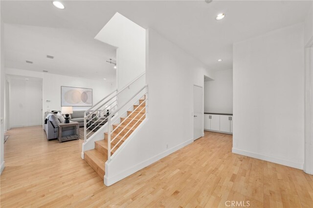 4462 Fallsbrae Rd, Fallbrook, CA 92028 - stairway with wood finished floors, recessed lighting, and baseboards