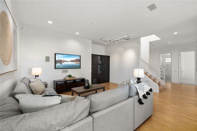 4462 Fallsbrae Rd, Fallbrook, CA 92028 - living room featuring light wood-style floors, stairway, and recessed lighting