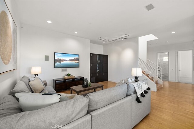 4462 Fallsbrae Rd, Fallbrook, CA 92028 - living room with light wood-style floors, stairway, recessed lighting, and baseboards