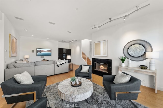 4462 Fallsbrae Rd, Fallbrook, CA 92028 - living area featuring light wood-style floors and a tile fireplace