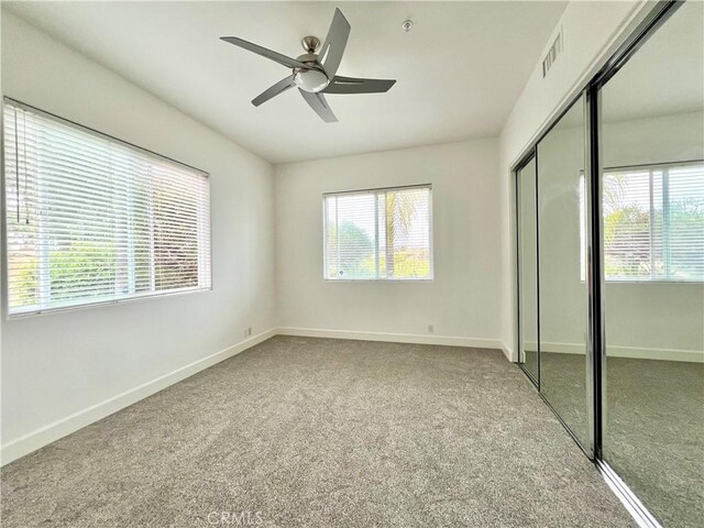 4462 Fallsbrae Rd, Fallbrook, CA 92028 - unfurnished bedroom featuring carpet flooring, a closet, baseboards, and ceiling fan