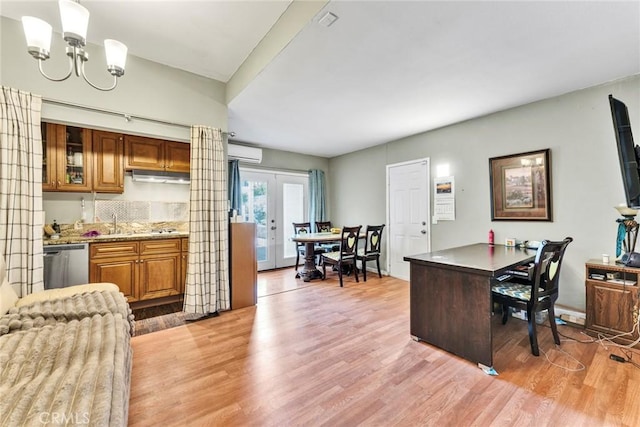 2517 Macbeth Ave, Corona, CA 92882 - kitchen featuring dishwasher, light wood-style floors, a chandelier, brown cabinetry, and glass insert cabinets