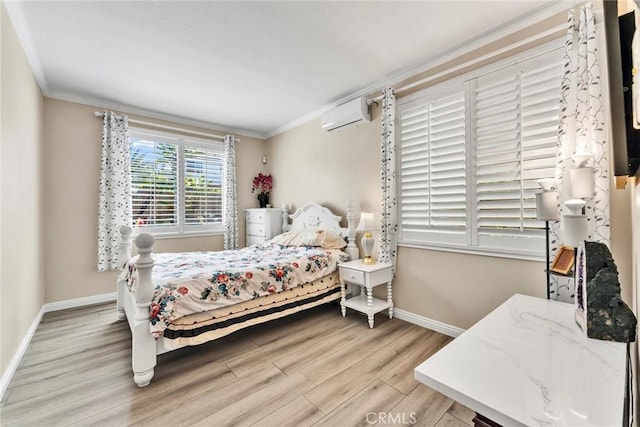 2517 Macbeth Ave, Corona, CA 92882 - bedroom with ornamental molding, a wall mounted AC, light wood finished floors, and baseboards