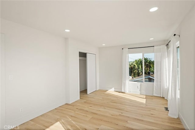 5662 Trail View Pl, Yorba Linda, CA 92886 - unfurnished bedroom with light wood-style floors, recessed lighting, a closet, and baseboards