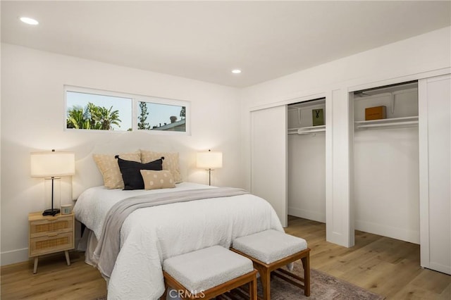 5662 Trail View Pl, Yorba Linda, CA 92886 - bedroom featuring multiple closets, light wood finished floors, baseboards, and recessed lighting