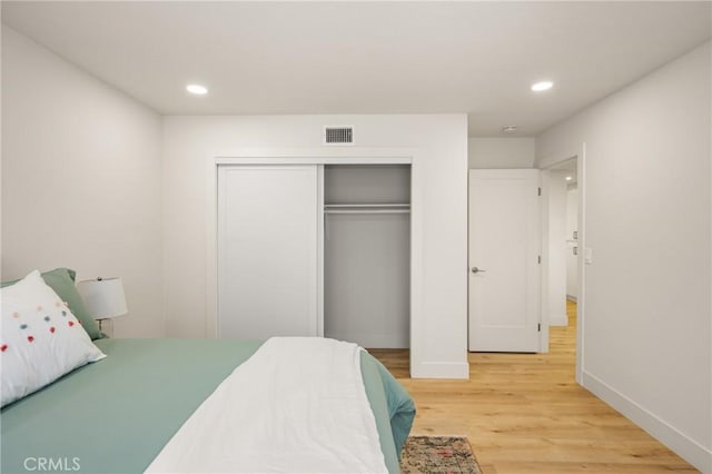 5662 Trail View Pl, Yorba Linda, CA 92886 - bedroom featuring light wood-style flooring, recessed lighting, baseboards, and a closet