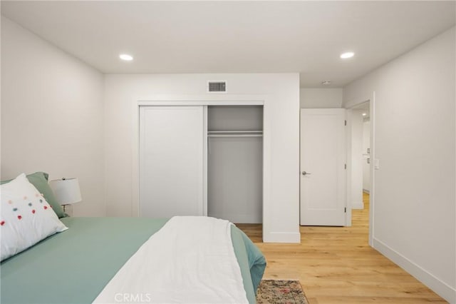 5662 Trail View Pl, Yorba Linda, CA 92886 - bedroom with light wood-type flooring, recessed lighting, and a closet
