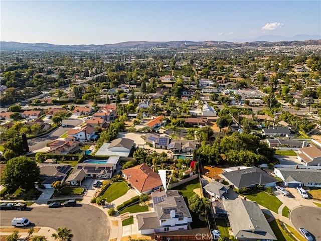 5662 Trail View Pl, Yorba Linda, CA 92886 - aerial overview of property's location featuring a mountain backdrop and nearby suburban area