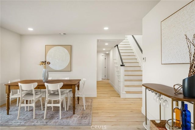 5662 Trail View Pl, Yorba Linda, CA 92886 - dining space featuring light wood-type flooring, stairway, and recessed lighting