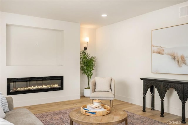 5662 Trail View Pl, Yorba Linda, CA 92886 - living room with a glass covered fireplace, recessed lighting, and wood finished floors