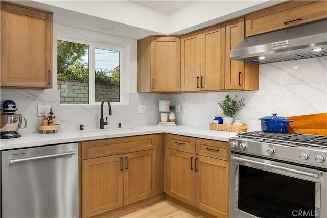 5662 Trail View Pl, Yorba Linda, CA 92886 - kitchen featuring appliances with stainless steel finishes, range hood, tasteful backsplash, and light countertops