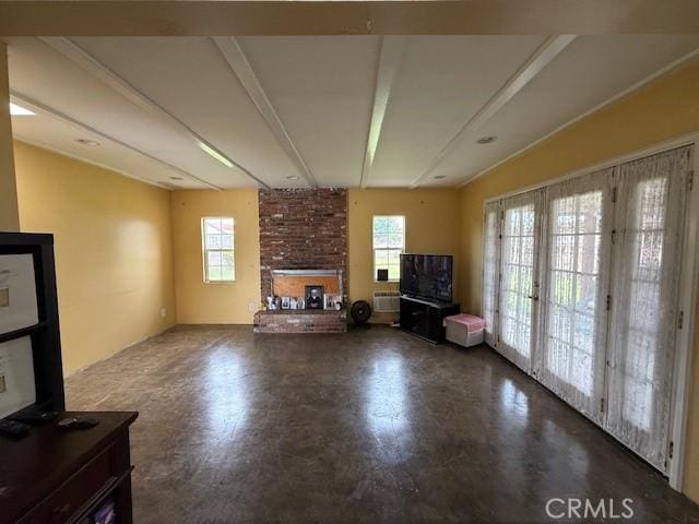 unfurnished living room with a brick fireplace