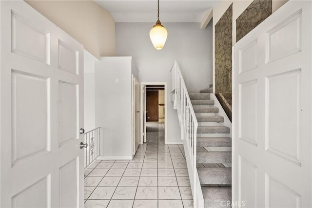 1403 W Westmont Dr, Anaheim, CA 92801 - foyer entrance featuring light marble finish flooring and stairway