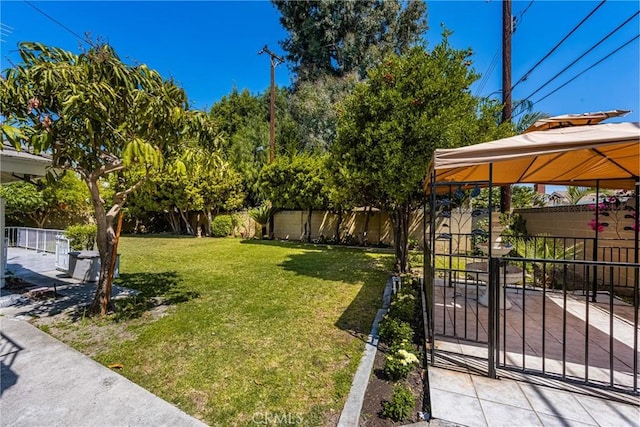 1403 W Westmont Dr, Anaheim, CA 92801 - view of yard featuring a gazebo, a gate, and a patio area