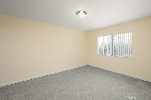 1403 W Westmont Dr, Anaheim, CA 92801 - empty room featuring carpet flooring and baseboards