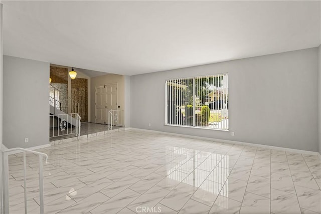 1403 W Westmont Dr, Anaheim, CA 92801 - spare room with marble finish floors and baseboards