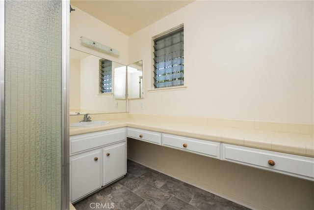 1403 W Westmont Dr, Anaheim, CA 92801 - bathroom featuring vanity and stone finish flooring
