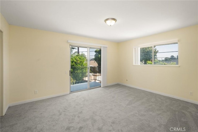 1403 W Westmont Dr, Anaheim, CA 92801 - carpeted spare room featuring baseboards