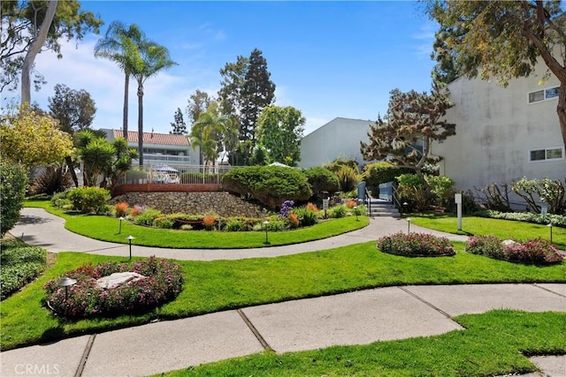 810 Camino Real Unit 104, Redondo Beach, CA 90277 - surrounding community with a lawn