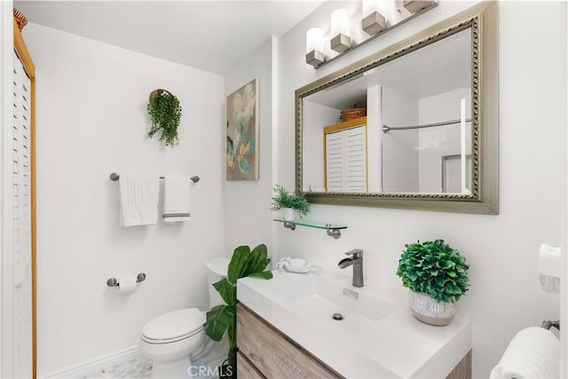 810 Camino Real Unit 104, Redondo Beach, CA 90277 - full bath featuring vanity, toilet, a shower, and baseboards