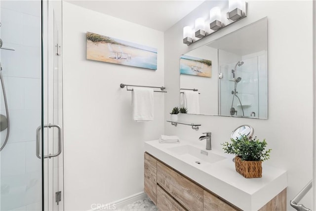 810 Camino Real Unit 104, Redondo Beach, CA 90277 - full bath featuring a shower stall, vanity, and baseboards
