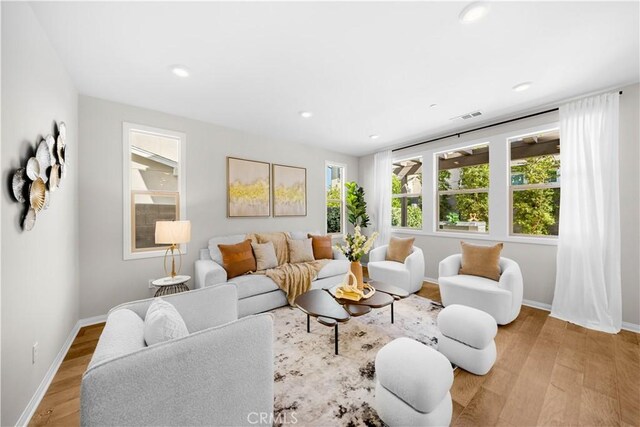 10 Veraz Rd, Rancho Mission Viejo, CA 92694 - living room with wood finished floors, baseboards, and recessed lighting