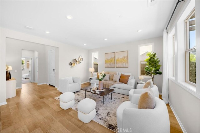 10 Veraz Rd, Rancho Mission Viejo, CA 92694 - living room with wood finished floors, baseboards, and recessed lighting