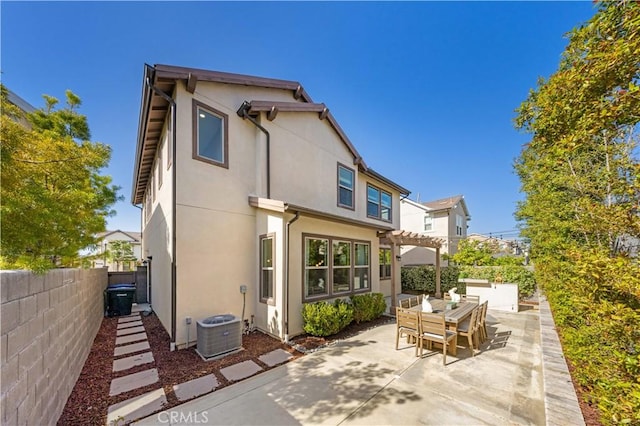 10 Veraz Rd, Rancho Mission Viejo, CA 92694 - rear view of house with central air condition unit, a pergola, stucco siding, a patio, and a fenced backyard