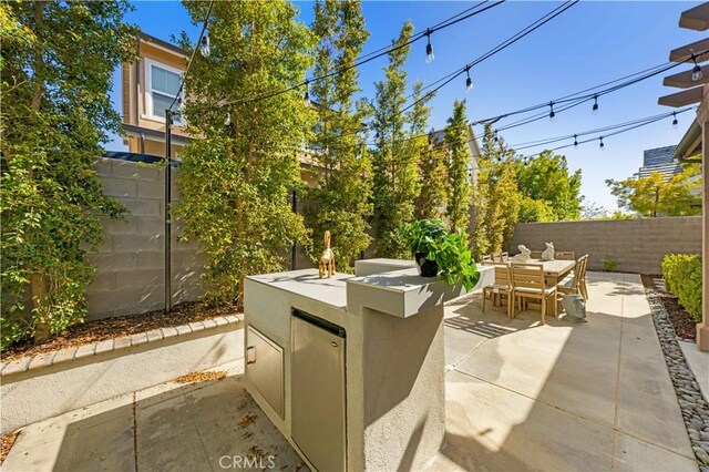 10 Veraz Rd, Rancho Mission Viejo, CA 92694 - view of patio / terrace featuring outdoor dining area and a fenced backyard