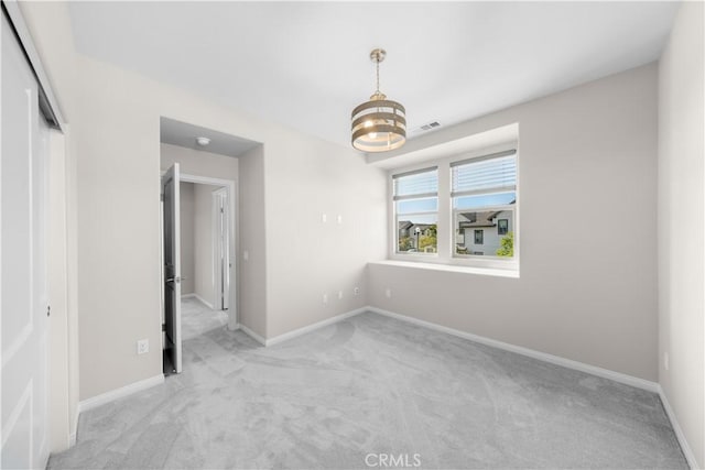10 Veraz Rd, Rancho Mission Viejo, CA 92694 - carpeted empty room featuring baseboards and a chandelier