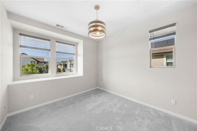 10 Veraz Rd, Rancho Mission Viejo, CA 92694 - carpeted spare room featuring baseboards and a chandelier