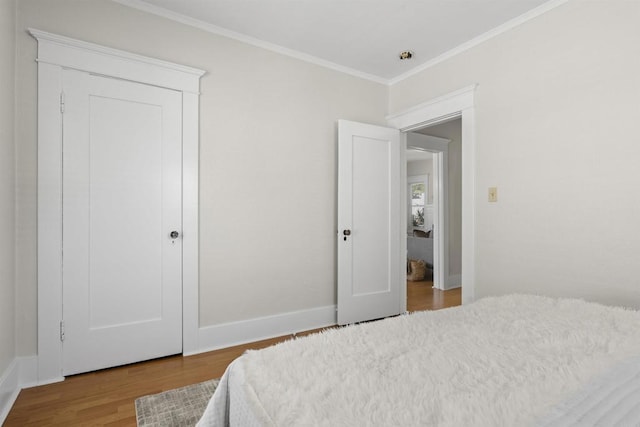 3536 Park Villa, San Diego, CA 92104 - bedroom featuring crown molding, wood finished floors, and baseboards