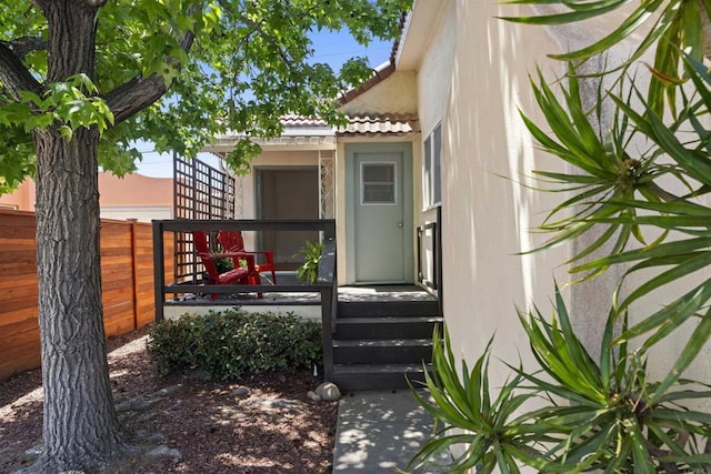 3536 Park Villa, San Diego, CA 92104 - property entrance featuring fence, a tiled roof, and stucco siding