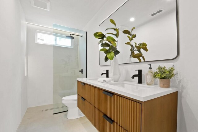 1736 Blackbird Cir, Carlsbad, CA 92011 - bathroom with toilet, double vanity, and a walk in shower
