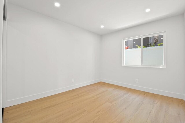 1736 Blackbird Cir, Carlsbad, CA 92011 - spare room with light wood-style floors, baseboards, and recessed lighting