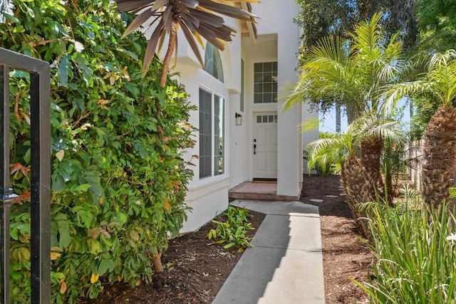 1736 Blackbird Cir, Carlsbad, CA 92011 - doorway to property featuring stucco siding
