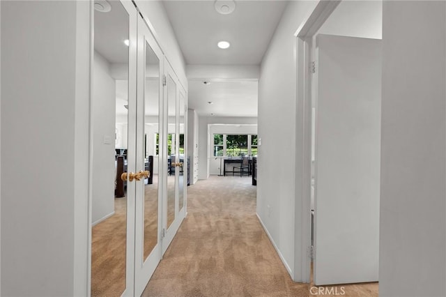 19439 Mayall St, Northridge, CA 91324 - corridor featuring french doors, light carpet, baseboards, and recessed lighting