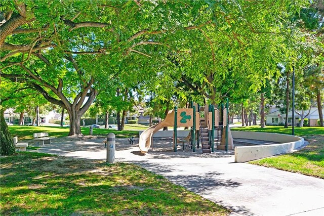 9 Northgrove Unit 11, Irvine, CA 92604 - community jungle gym featuring a lawn