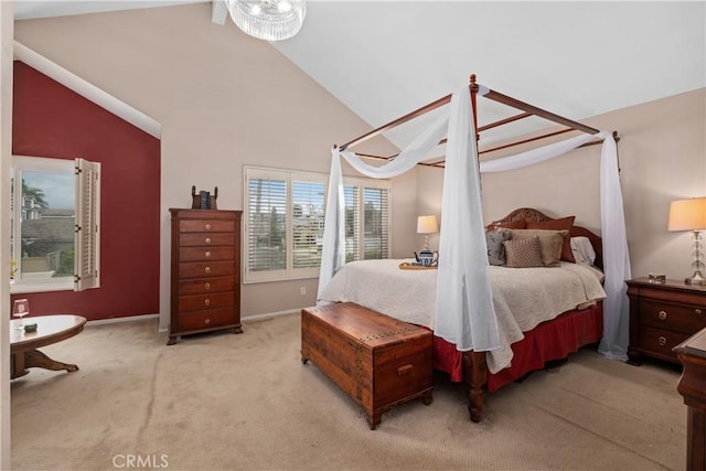 9 Northgrove Unit 11, Irvine, CA 92604 - bedroom featuring lofted ceiling, light colored carpet, and baseboards