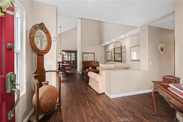9 Northgrove Unit 11, Irvine, CA 92604 - living room with dark wood-type flooring, baseboards, and high vaulted ceiling