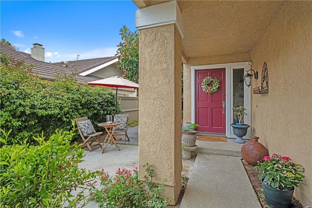 9 Northgrove Unit 11, Irvine, CA 92604 - property entrance featuring stucco siding and a patio area